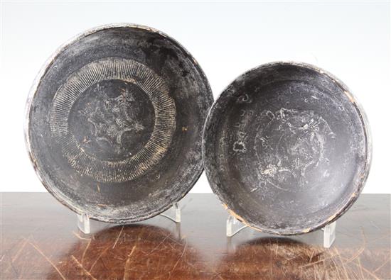 Two Greek blackware bowls, Apulia, c.4th century BC, 16.5cm and 19.5cm